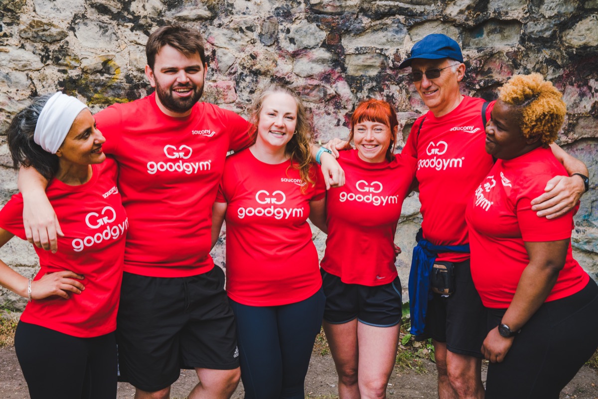 GoodGym runners stretching out after a run