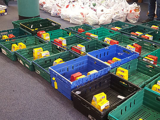 Packing food ready for a food drop