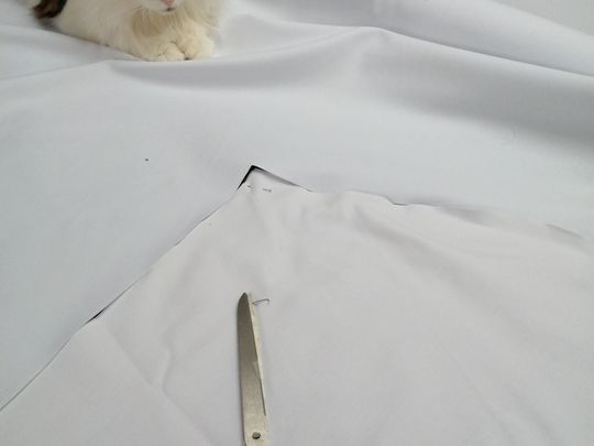 Helping to make gowns and scrubs for dentists 