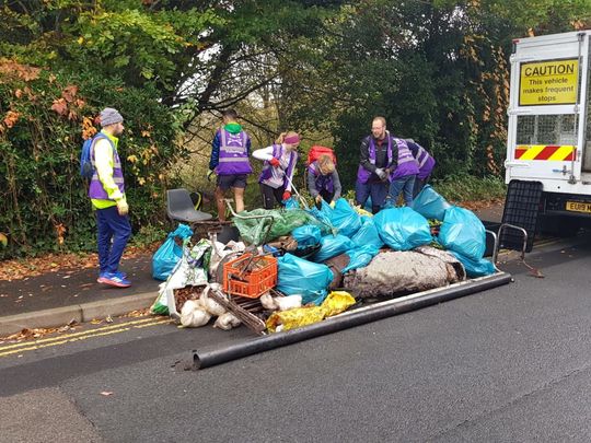 Putting a rake on the fly tipping. 