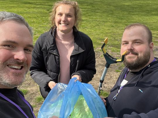 Litter picking in the park with my colleagues 