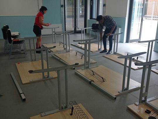 We built this community centre on donated desks!