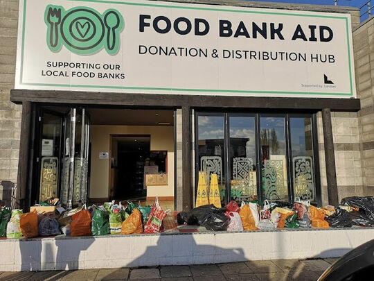 Helping out Food Bank Aid charity at their Food Hub