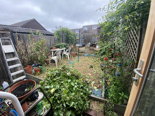 Transforming Mrs S’ garden in the rain