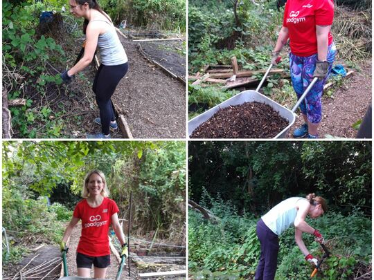 Weeding and wheeling at the windmill