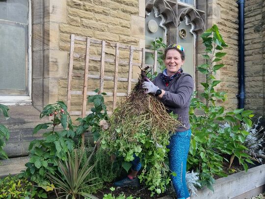 Wednesday weeding filling Michelle's green wheelie bin on two wheels 