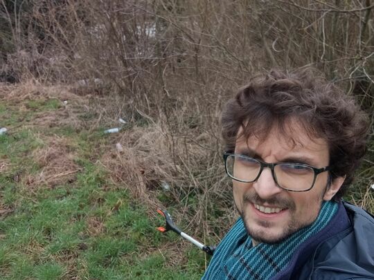 Early morning litter picking around the flooded park