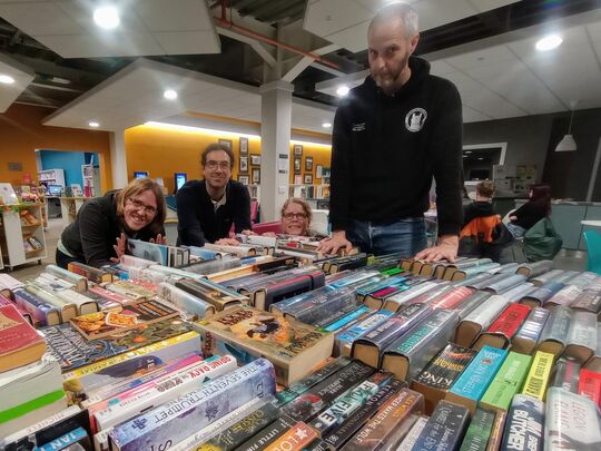 Unpacking books from boxes