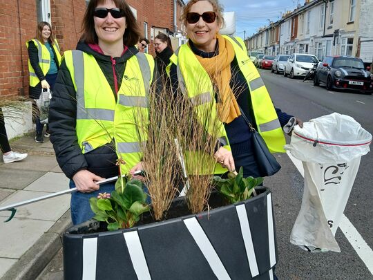 Elephant ears & pheasant tails in zebra planters!