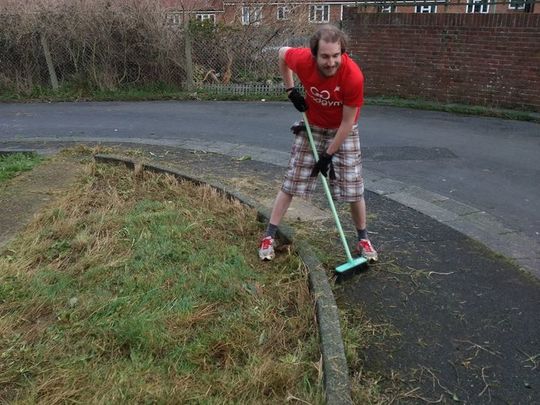 Raking a difference to Mrs C's garden